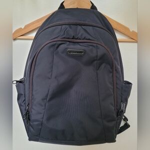Pacsafe Metrosafe 350 GII Backpack In Deep Navy & Light Green